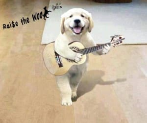 A standing dog smiles while holding a guitar with text above reading "Raise the Woof.