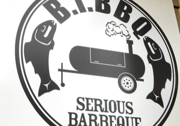 BBQ logo with fish and smoker.