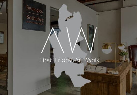 Interior view of an office space with "First Friday Art Walk" event text and logo overlay. The office features modern furniture and decor.