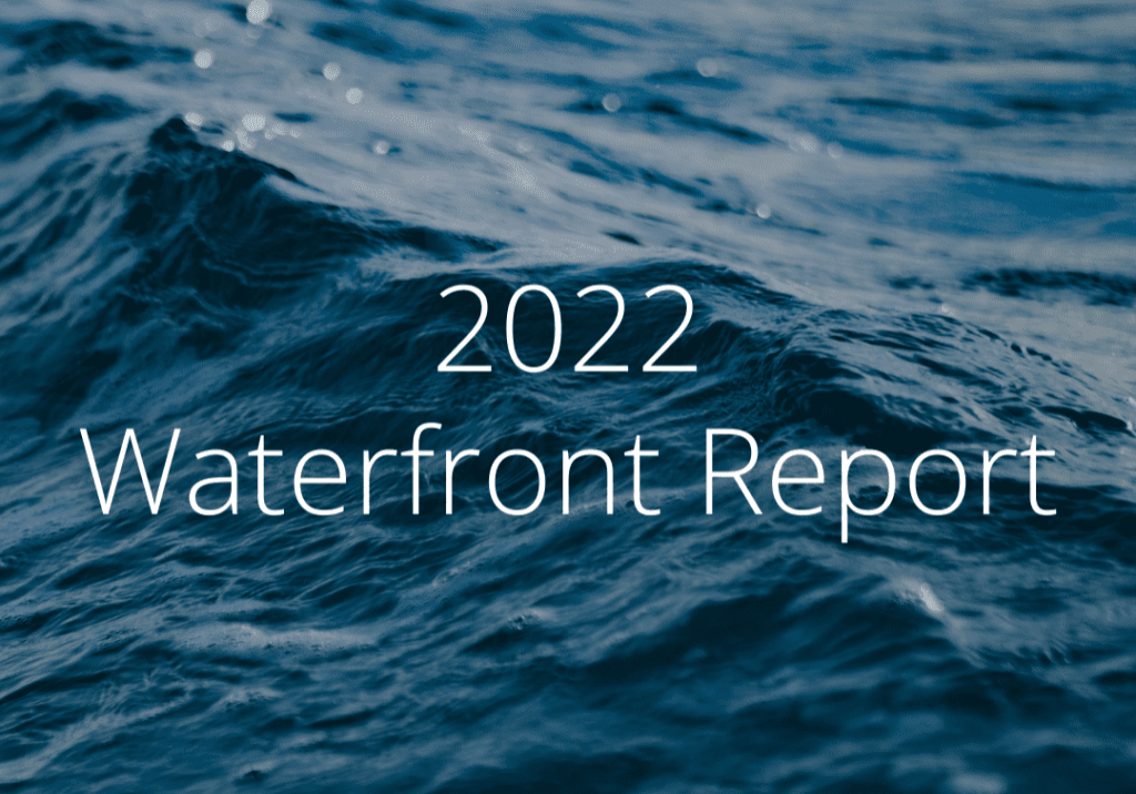 Image of ocean waves with the text "2022 Waterfront Report" overlaid in the center.