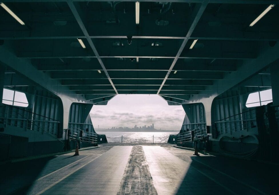 View from inside a ferry, city skyline.