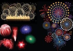 A variety of fireworks displays illuminate the night sky, showcasing different colors and patterns.