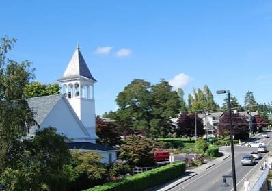 White church steeple in a small town.